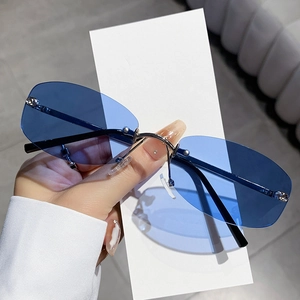 Fashionable rimless polygon sunglasses with blue lenses and silver metal frame