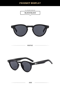 Front and side view of black round sunglasses featuring silver star-shaped metal accents