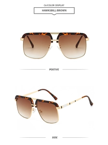 Detail view of tortoiseshell aviator sunglasses with gold frames and brown gradient lenses