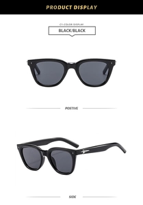Detailed front and side views of black polygon sunglasses with silver star logo on temples