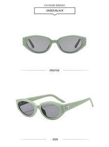 Grüne Cat-Eye-Sonnenbrille mit grauen Gläsern und silbernen Details aus zwei Winkeln