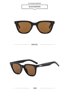 Detailed view of polygon retro sunglasses with silver cross star metal accents