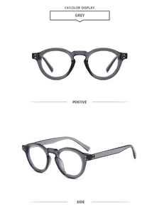 Front and side views of vintage round grey sunglasses with translucent frames and clear lenses