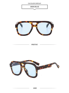 Detail of tortoise frame aviator sunglasses with double bridge and blue lenses