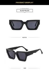 Detail view of thick-frame polygon sunglasses with dark lenses and durable hinges