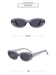 Front and side views of vintage oval sunglasses with transparent grey frames and dark lenses
