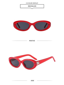 Front and side views of red oval sunglasses with grey lenses and silver hinge details