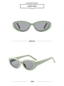Detail of oval sage green sunglasses with grey lenses and silver triple-bar side temples