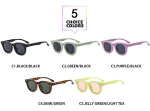 Flat lay of vintage oval sunglasses in five colors including black and tortoiseshell