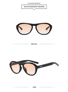 Vue détaillée de lunettes de soleil pilote noires avec verres dégradés orange tendance