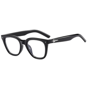 Chic polygonal black sunglasses with retro silver star detail on frame for outdoor wear