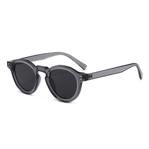 Classic round frame retro sunglasses with dark grey translucent frames and lenses