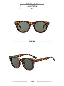 Detail view of tortoiseshell oval frame sunglasses with green lenses from front and side angles