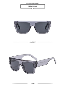 Detailed front and side view of square grey frames with metallic rivet accents