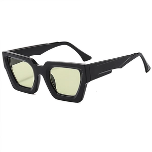 Modern thick black frame square sunglasses with translucent yellow-green lenses