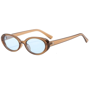 Vintage oval sunglasses with amber tortoiseshell frame and light blue lenses for fashion