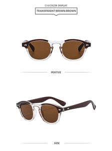 Retro round sunglasses with transparent brown frame and silver rivets on white background