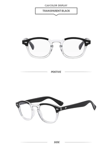 Detail view of vintage round sunglasses in transparent black finish with metal rivet accents