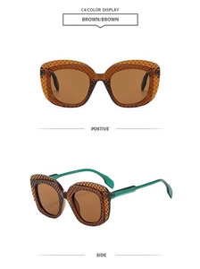 Détail de lunettes de soleil polygonales avec verres bruns et branches vertes translucides