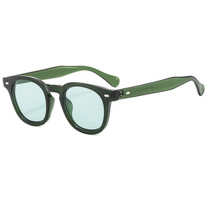 Retro transparent green sunglasses with light blue lenses and classic rivet details