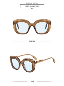 Vue détaillée des grandes lunettes de soleil hip-hop avec monture marron et verres bleus