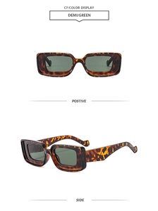 Detail view of square tortoiseshell sunglasses with dark green lenses in front and side perspectives