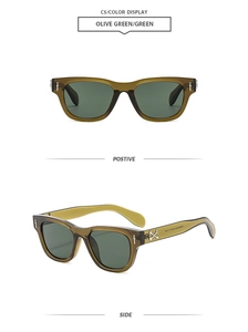 Dettaglio occhiali da sole quadrati verde oliva con decori a pugnale gotico in argento