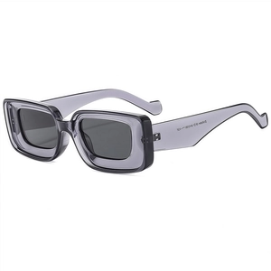 Modern rectangular thick frame sunglasses in transparent grey with dark lenses