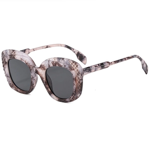 Lunettes de soleil polygonales oversize à monture lavande texturée et verres gris foncé