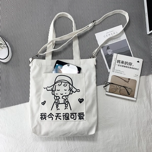 White canvas tote bag featuring cute girl illustration and adjustable shoulder strap