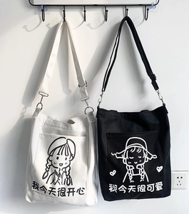 Minimalist canvas messenger bag with cute cartoon print and adjustable shoulder straps