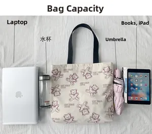 Spacious canvas tote bag with purple bear prints showing internal storage capacity