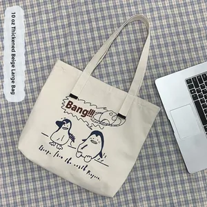 Detail of 16oz thickened cream canvas tote bag with cute penguin print and large capacity