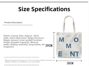 Detail view of canvas tote bag with MOMENT print showing 38x39cm size and large capacity