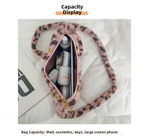 Internal view of pink leopard plush crossbody bag showing space for iPad and essentials