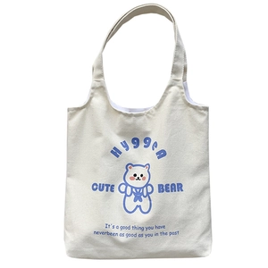 Borsa tote minimalista in tela color crema con stampa di orsetto blu e scritta Hyggea
