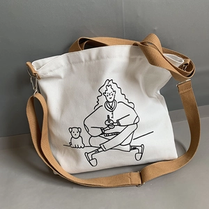 White canvas tote bag with minimalist cartoon illustration and brown adjustable strap