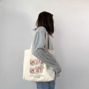 Minimalist SunSet printed canvas tote bag for women featuring a stylish red graphic design