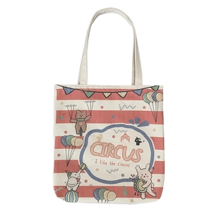 White canvas tote bag with red stripes and hand-drawn circus animal illustrations