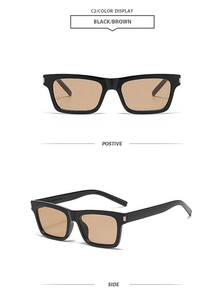 Detail view of square retro sunglasses with black frames and brown lenses