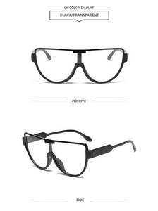 Front- und Seitenansicht der übergroßen Halbrand-Modebrille mit klaren Gläsern