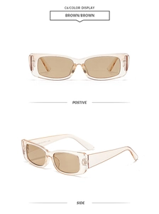 Détail de lunettes de soleil polygonales champagne avec verres bruns et code C6