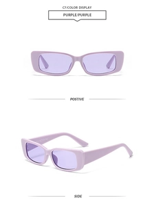 Détail de lunettes de soleil polygonales violettes avec monture rétro en résine