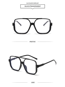 Detail view of double-bridge square black frames with transparent lenses for glasses