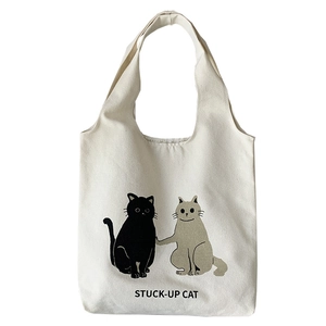 Japanese style canvas tote bag with cute cat illustration and STUCK-UP CAT text