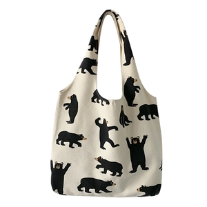 Minimalist canvas tote bag with all-over hand-drawn black bear pattern for women