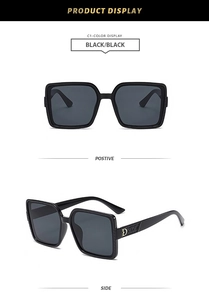 Vue détaillée des lunettes de soleil noires carrées avec logo D doré et texture matelassée