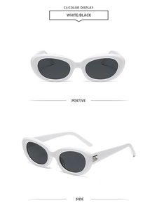 Detail view showing white oval sunglasses with silver metal hinge accents and black lenses