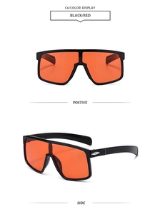 Detail view of black frame cycling sunglasses with red lenses and non-slip temple tips