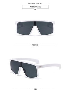 Detail of white cycling sunglasses with silver diamond decor and wide temple design
